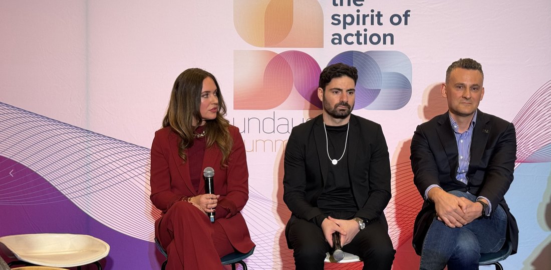 Andrii Moroz on a panel discussion at a founders summit